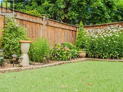 Beautiful mature gardens with artificial grass - 