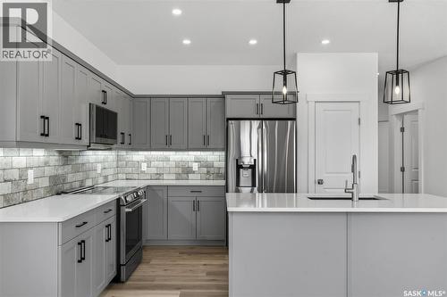801 Kerr Cove, Prince Albert, SK - Indoor Photo Showing Kitchen With Stainless Steel Kitchen With Upgraded Kitchen