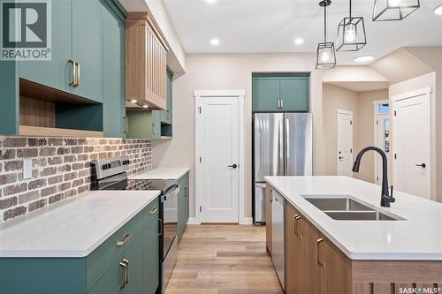 458 Fortosky Manor, Saskatoon, SK - Indoor Photo Showing Kitchen With Double Sink With Upgraded Kitchen