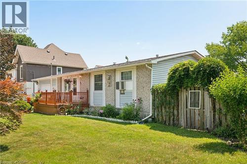 Exterior featuring light brick and light blue siding - 162 Tiffany Street, Cambridge, ON - Outdoor With Deck Patio Veranda