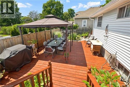 Expansive wood-finish deck with a patio cover and privacy fencing - 162 Tiffany Street, Cambridge, ON - Outdoor With Deck Patio Veranda