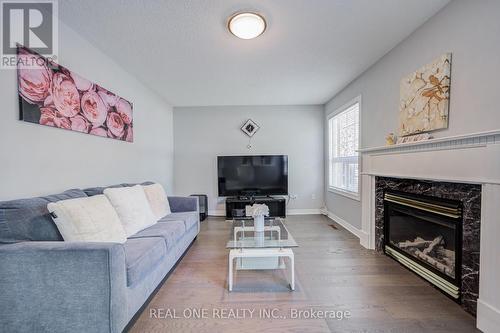 5827 Rainspring Drive, Mississauga, ON - Indoor Photo Showing Living Room With Fireplace