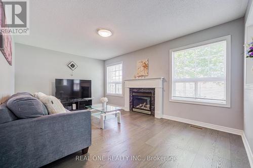 5827 Rainspring Drive, Mississauga, ON - Indoor Photo Showing Living Room With Fireplace