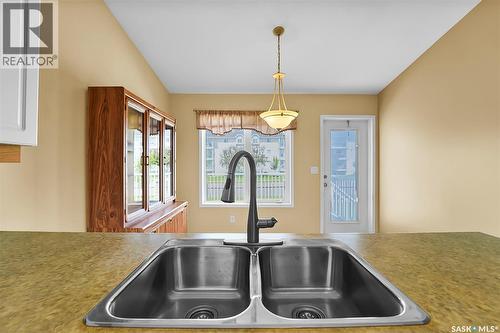 116 835 Heritage Green, Saskatoon, SK - Indoor Photo Showing Kitchen With Double Sink