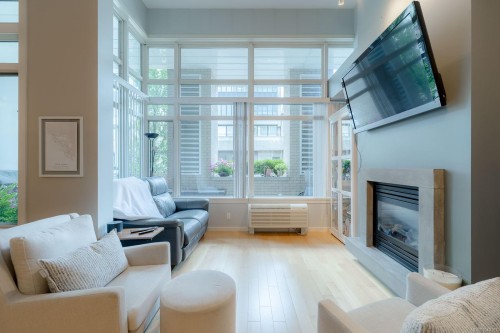 #103-38 Front St, Nanaimo, BC - Indoor Photo Showing Living Room With Fireplace