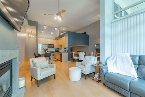 #103-38 Front St, Nanaimo, BC - Indoor Photo Showing Living Room With Fireplace