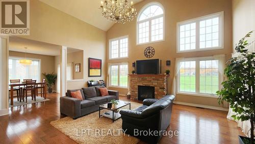 12 Plowright Road, Springwater, ON - Indoor Photo Showing Living Room With Fireplace