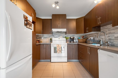 Kitchen - 200-90 Rue Bruchési, Blainville, QC - Indoor Photo Showing Kitchen With Double Sink
