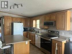 open concept kitchen with large pantry - 