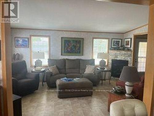 Bright livingroom with gas fireplace - 1 25 Thames Road, St. Marys, ON - Indoor Photo Showing Living Room