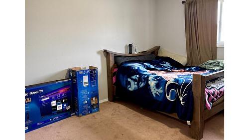 B-1801 Kelowna Crescent, Cranbrook, BC - Indoor Photo Showing Bedroom