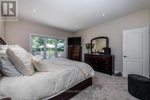 Primary Suite - 5 Pine Hill Drive, Springwater, ON - Indoor Photo Showing Bedroom
