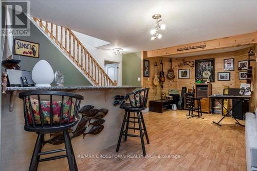 Lower level bar and hobby area - 5 Pine Hill Drive, Springwater, ON - Indoor Photo Showing Other Room