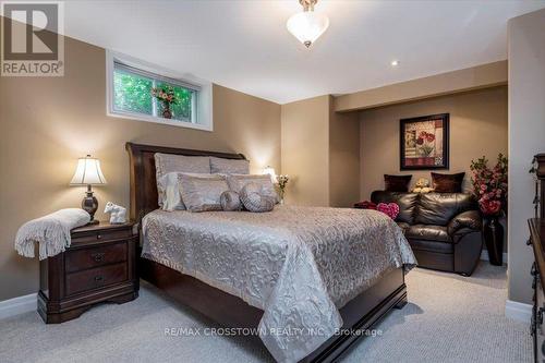 Guest suite with sitting area - 5 Pine Hill Drive, Springwater, ON - Indoor Photo Showing Bedroom