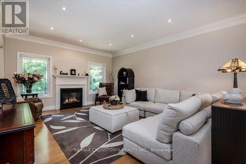 Livingroom - 5 Pine Hill Drive, Springwater, ON - Indoor Photo Showing Living Room With Fireplace