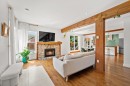 Vue d'ensemble - 31 Rue St-Stanislas, Sainte-Thérèse, QC  - Indoor Photo Showing Living Room With Fireplace 