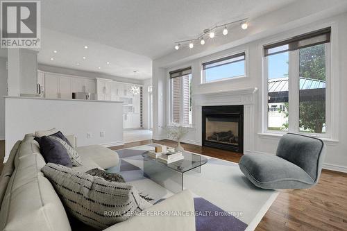 Image has been virtually staged - 171 Trail Side Circle, Ottawa, ON - Indoor Photo Showing Living Room With Fireplace