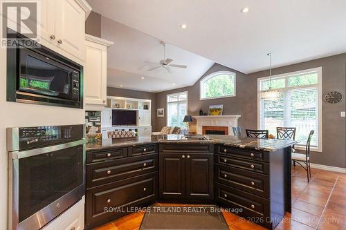 321 Hartson Road, London North (North O), ON - Indoor Photo Showing Kitchen With Fireplace