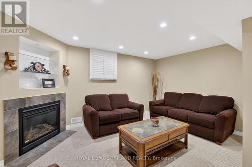 Basement Sitting Room - 46 Garden Walk, London South (South N), ON - Indoor With Fireplace