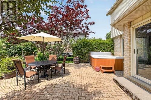 Brick Patio + Hot Tub - 46 Garden Walk, London South (South N), ON - Outdoor With Deck Patio Veranda