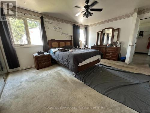 Main level primary bedroom - 2 Mclean Boulevard W, Augusta, ON - Indoor Photo Showing Bedroom