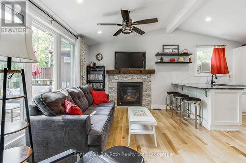 8 Arbor Road, Tiny, ON - Indoor Photo Showing Living Room With Fireplace