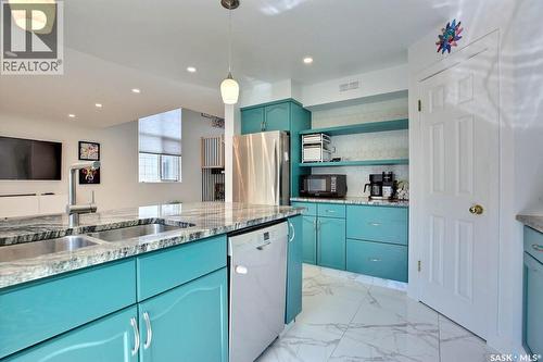 3544 Basswood Grove, Regina, SK - Indoor Photo Showing Kitchen With Double Sink With Upgraded Kitchen