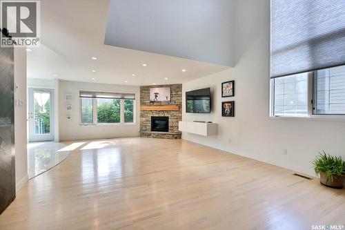 3544 Basswood Grove, Regina, SK - Indoor With Fireplace