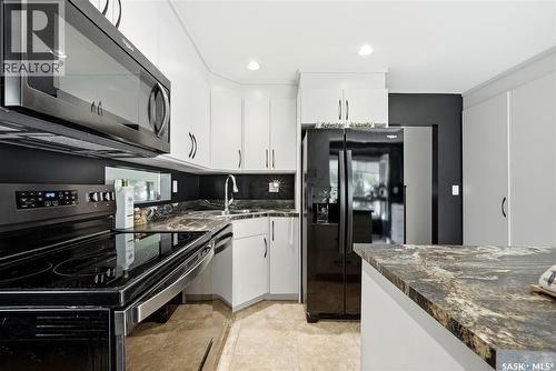 111 Bell Street, Regina, SK - Indoor Photo Showing Kitchen With Double Sink