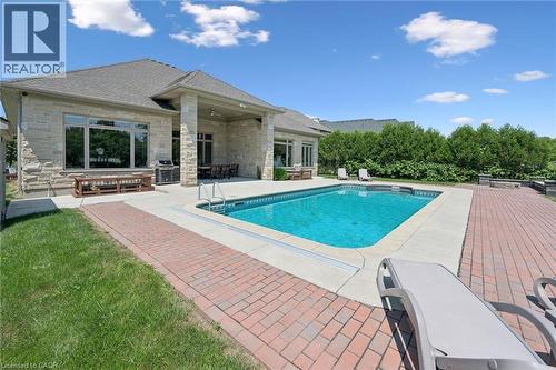 596 Regal Place, Waterloo, ON - Outdoor With In Ground Pool