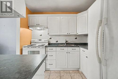 1417 - 2000 Jasmine Crescent, Ottawa, ON - Indoor Photo Showing Kitchen With Double Sink