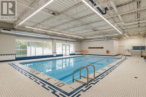 1417 - 2000 Jasmine Crescent, Ottawa, ON - Indoor Photo Showing Other Room With In Ground Pool