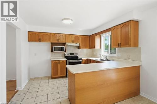 448 Stone Church Road E, Hamilton, ON - Indoor Photo Showing Kitchen With Double Sink