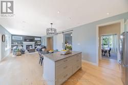 Oversized island with stone dining extension - 