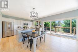 Oversized island with stone dining extension - 