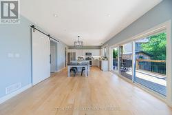Glass sliding doors to 300 sq ft covered back deck - 