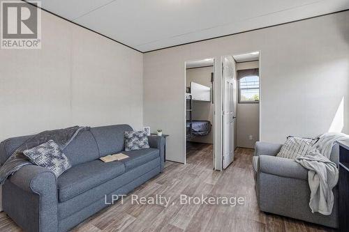 Pull-out Couch sleeps 2 - Lba047 - 1235 Villiers Line, Otonabee-South Monaghan, ON - Indoor Photo Showing Living Room