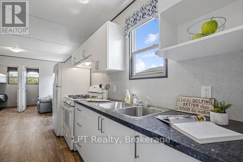 Lba047 - 1235 Villiers Line, Otonabee-South Monaghan, ON - Indoor Photo Showing Kitchen With Double Sink