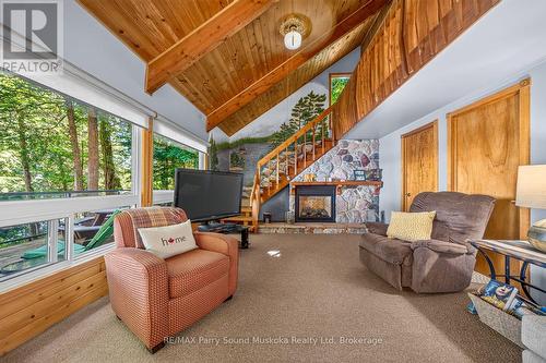 2 South Point Drive, Mckellar, ON - Indoor With Fireplace
