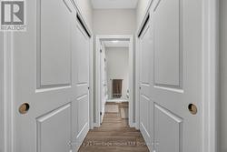 Walk through double closets in primary bedroom. - 
