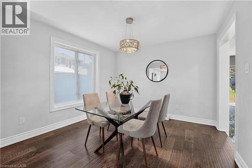 Dining area featuring dark wood-finish flooring, light gray walls, and white trim - 3346 Chartrand Crescent, Mississauga, ON - Indoor Photo Showing Dining Room