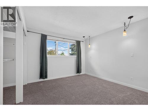 2220 Thacker Drive, West Kelowna, BC - Indoor Photo Showing Other Room With Fireplace