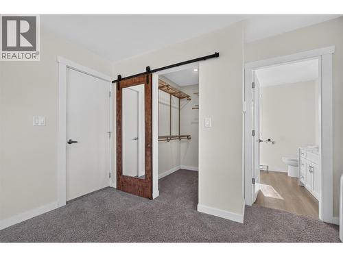 2nd bedroom upstairs - 2220 Thacker Drive, West Kelowna, BC - Indoor Photo Showing Other Room