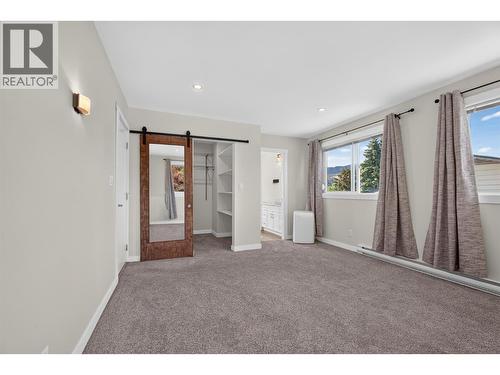 2nd bedroom upstairs - 2220 Thacker Drive, West Kelowna, BC - Indoor Photo Showing Other Room