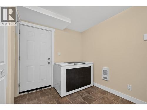 suite laundry and med room, separate entrance - 2220 Thacker Drive, West Kelowna, BC - Indoor Photo Showing Other Room