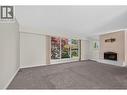**Virtually Staged** primary bedroom - 2220 Thacker Drive, West Kelowna, BC  - Indoor Photo Showing Bedroom 