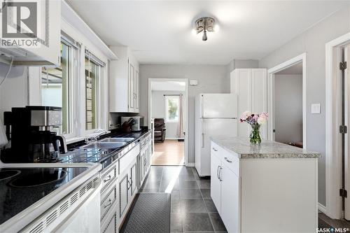 1728 2Nd Avenue N, Saskatoon, SK - Indoor Photo Showing Kitchen With Double Sink