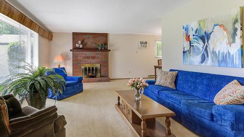 2434 Rhondda Crescent, Kelowna, BC - Indoor Photo Showing Living Room With Fireplace