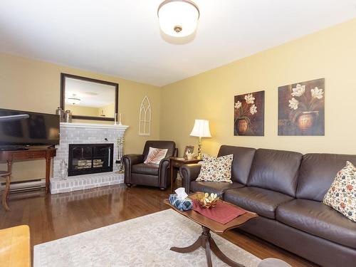 12 Central Avenue, Amherst, NS - Indoor Photo Showing Living Room With Fireplace