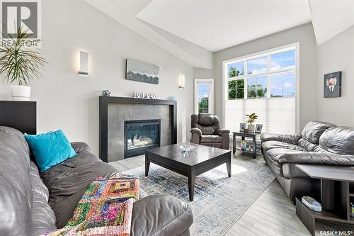 547 Bayview Terrace, Saskatoon, SK - Indoor Photo Showing Living Room With Fireplace